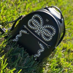 Fendi small leather pearl-embroidered bow backpack